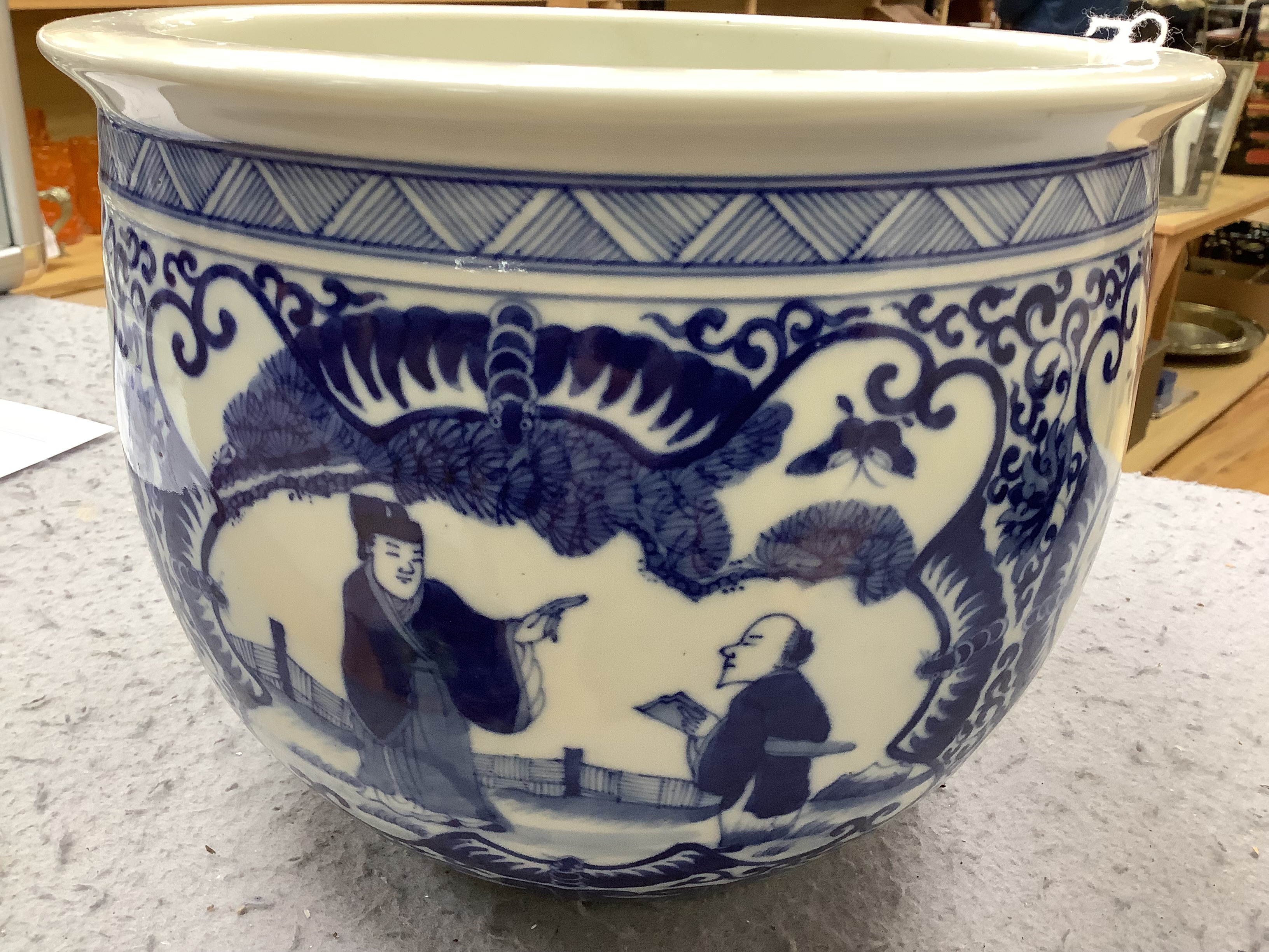 A Chinese blue and white jardiniere on stand, 24cm total height